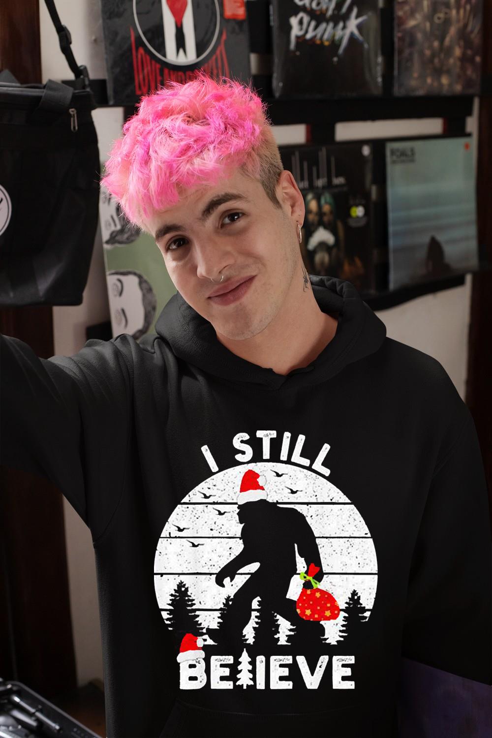 h212 bigfoot santa hat i still believe christmas shirt hoodie - Bigfoot Santa hat I still believe Christmas shirt